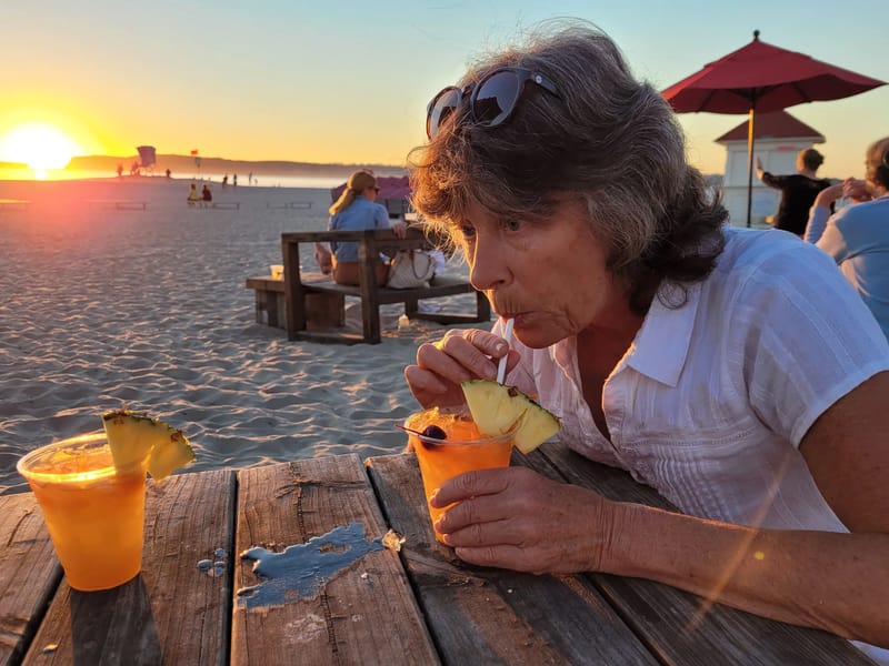 Lolo very much enjoying her exotic rum drink at the Hotel del Coronado