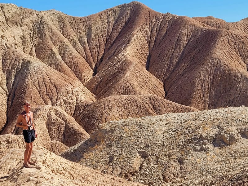 Herb playing on the Hills of the Moon Badlands